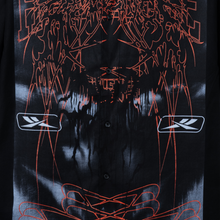 Load image into Gallery viewer, Black shirt with red graphics on a black button up
